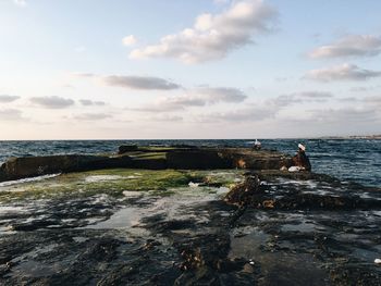 Scenic view of calm sea against sky