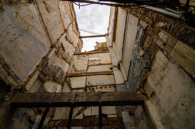 Low angle view of stairs against built structure