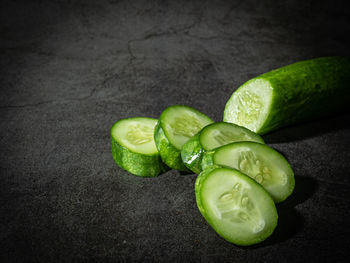Close-up of green pepper against black background