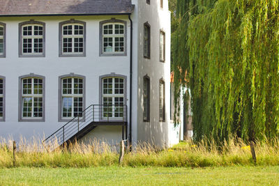 Exterior of house on field against building