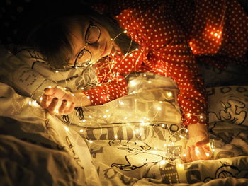 Woman lying down on bed