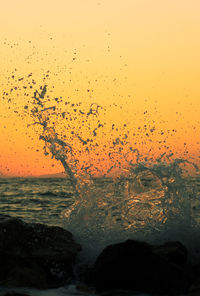 Scenic view of sea at sunset