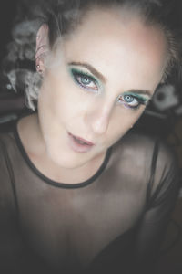 Close-up portrait of a smiling young woman