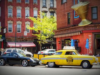 Cars on street in city