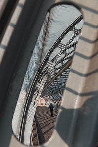 High angle view of person walking through a tunnel