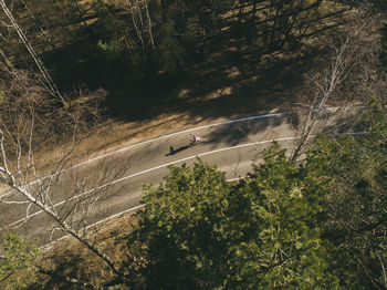 Aerial view of person skateboarding on road