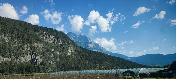 Panoramic view of lake and mountains against sky