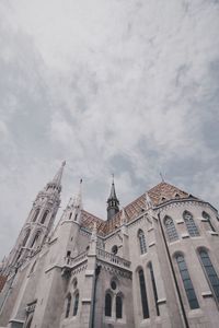 Low angle view of building against cloudy sky. what a perfect view right