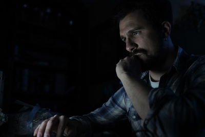 Portrait of young man looking away
