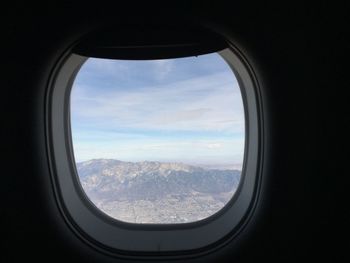 View of landscape through airplane window