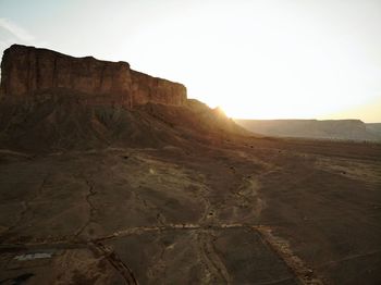 Rock formations on landscape against sky