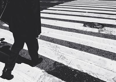 Shadow of people on road