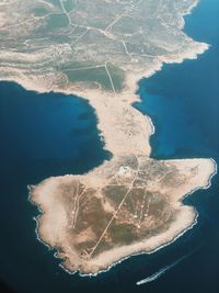 High angle view of rocks in sea