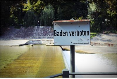 Information sign by lake