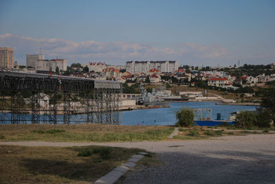 Buildings in city against sky