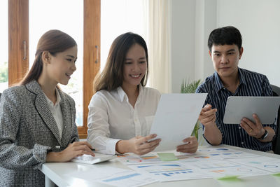 Business colleagues working at office