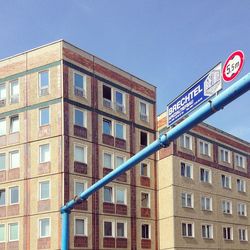 Low angle view of office building against sky