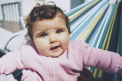 Portrait of cute baby girl at home