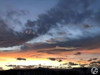 Low angle view of dramatic sky during sunset