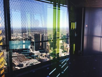 Cityscape seen through window