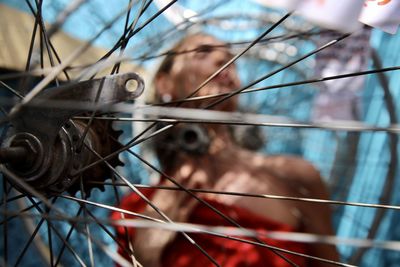 Low angle view of bird in cage