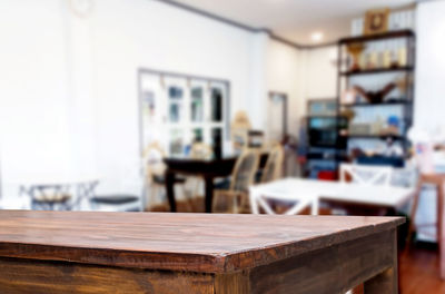 Empty chairs and table in restaurant