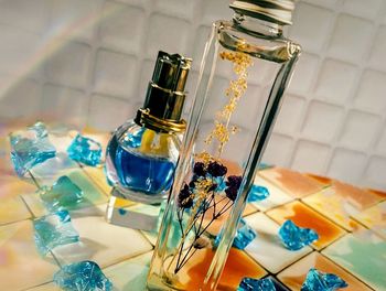 Close-up of glass bottle on table