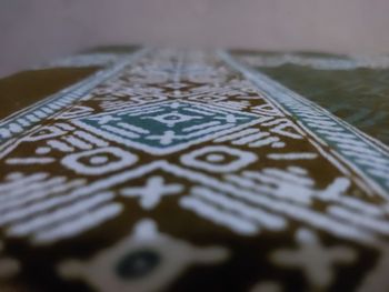 High angle view of piano on table