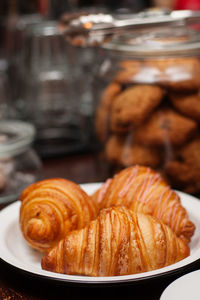 Close-up of bread in plate on table