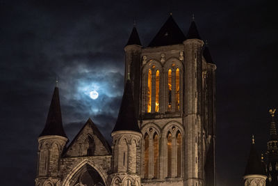 Low angle view of historical building against sky at night