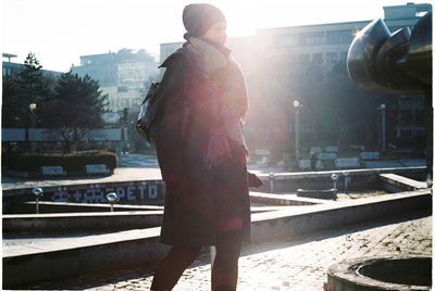 Midsection of man standing against the sky