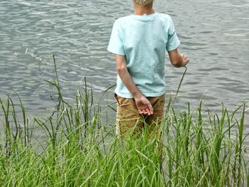 Full length of a man standing in lake