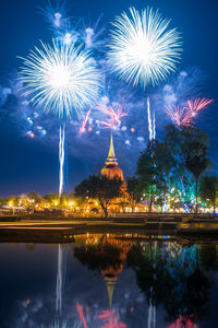 Firework display at night