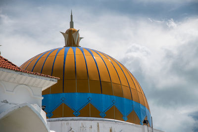 Low angle view of traditional building against sky