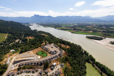 High angle view of town against cloudy sky