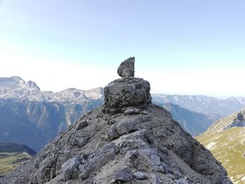 Rock formations on mountain against sky