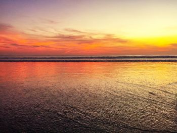 Scenic view of dramatic sky during sunset