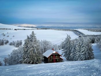 Lonely cabin in the mountains during winter