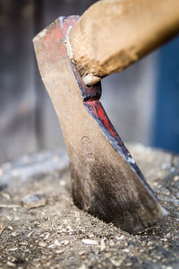 Close-up of chain on wood