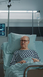 Portrait of man sitting in office