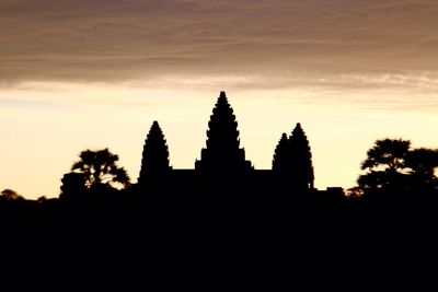 Silhouette of temple at sunset