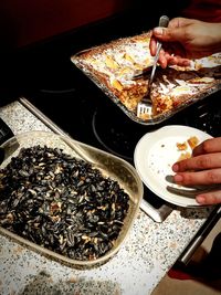 Close-up of hand holding food
