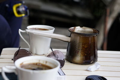 Close-up of coffee cup on table