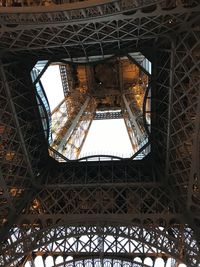 Low angle view under the eiffel tower. 