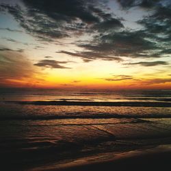 Scenic view of sea at sunset