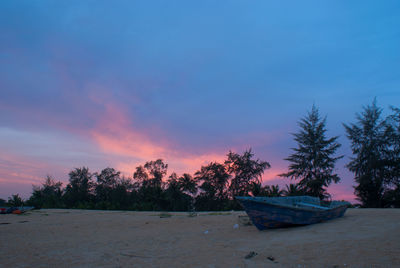 Scenic view of beach against sky during sunset