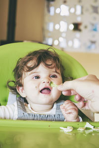 Portrait of cute baby girl at home