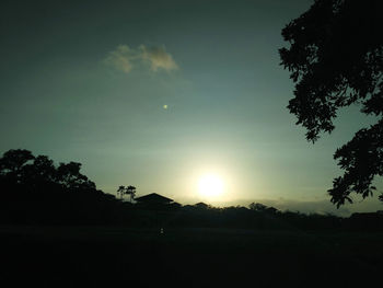 Scenic view of silhouette landscape against sky during sunset