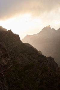 Scenic view of mountains against sky during sunset