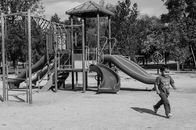 Girl playing on playground at park